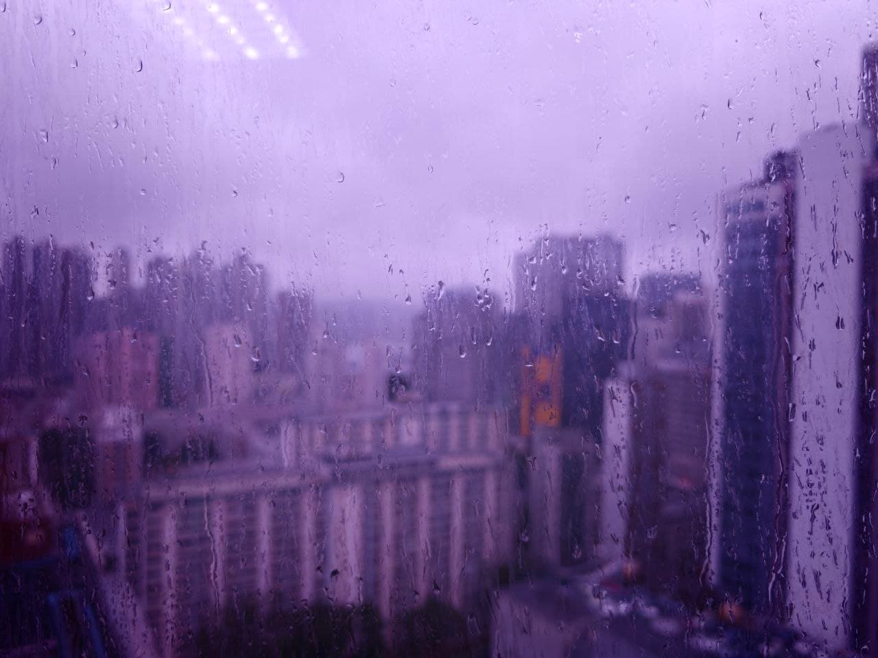Rainy day view over Tsuen Wan from the MTC Workspace windows